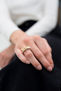 Model wearing ethically sources rings from recycled silver