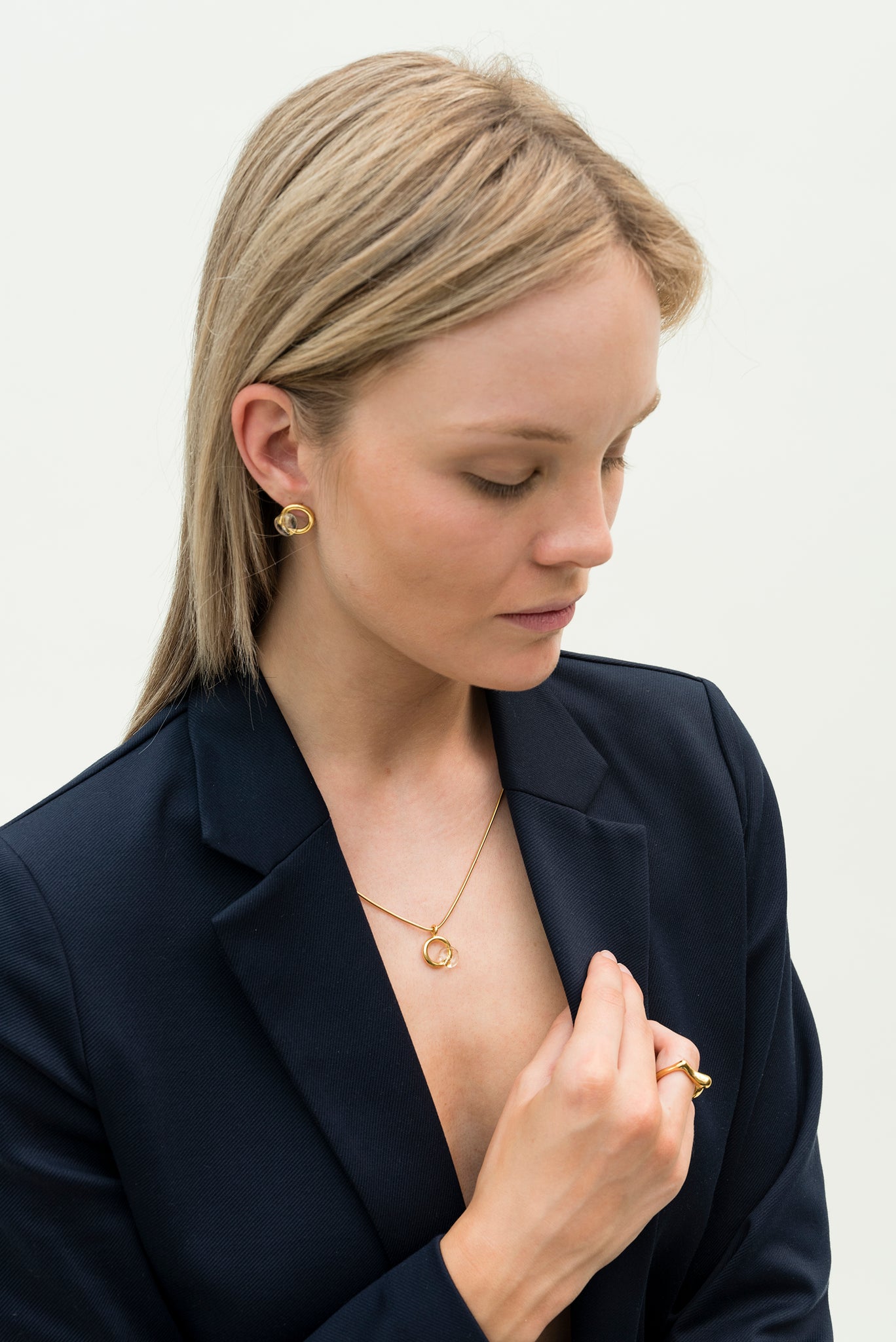 Model wearing sustainable jewelry made from recycled silver 